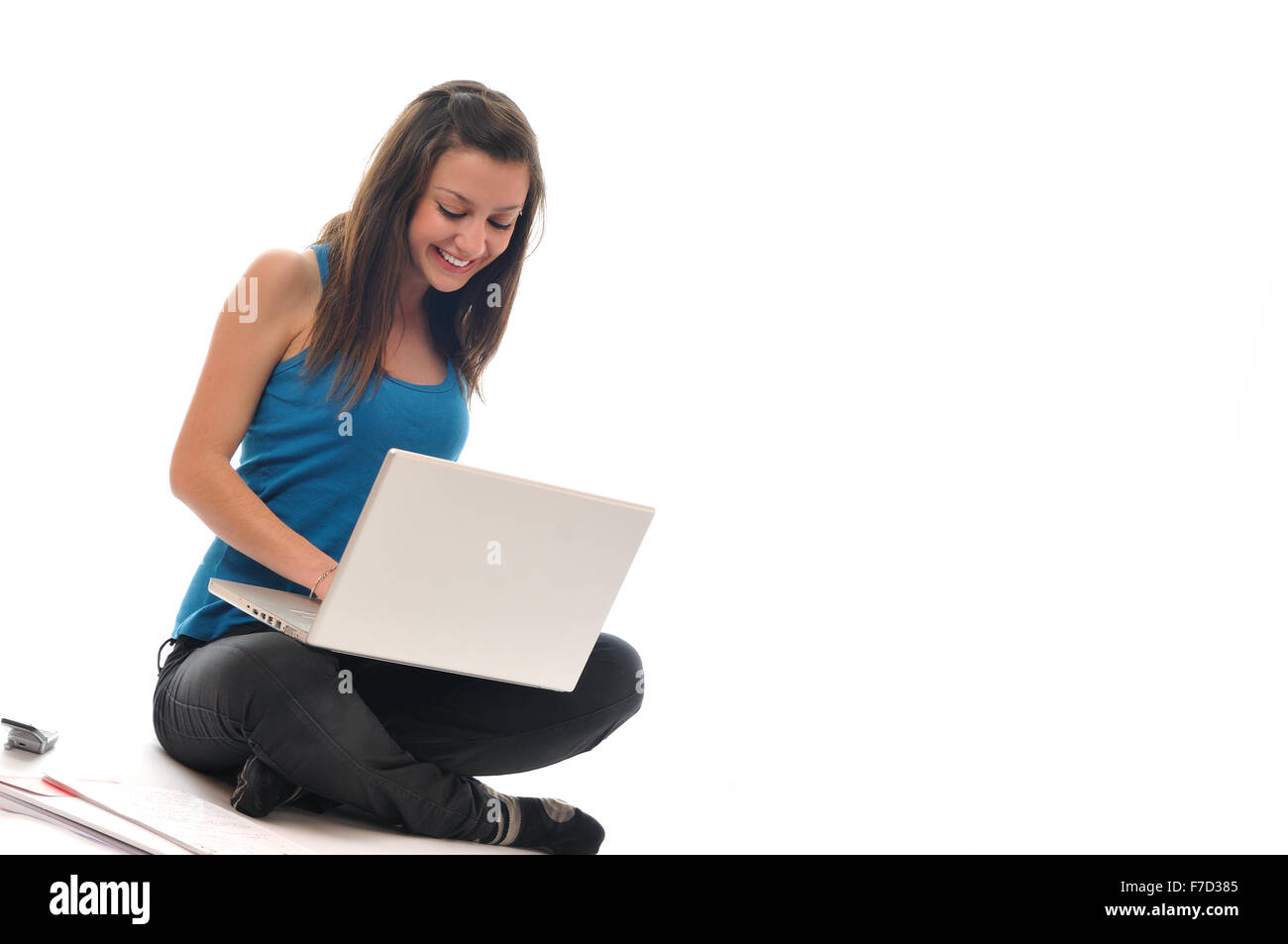 one young teen woman girl work on laptop isolated Stock Photo - Alamy