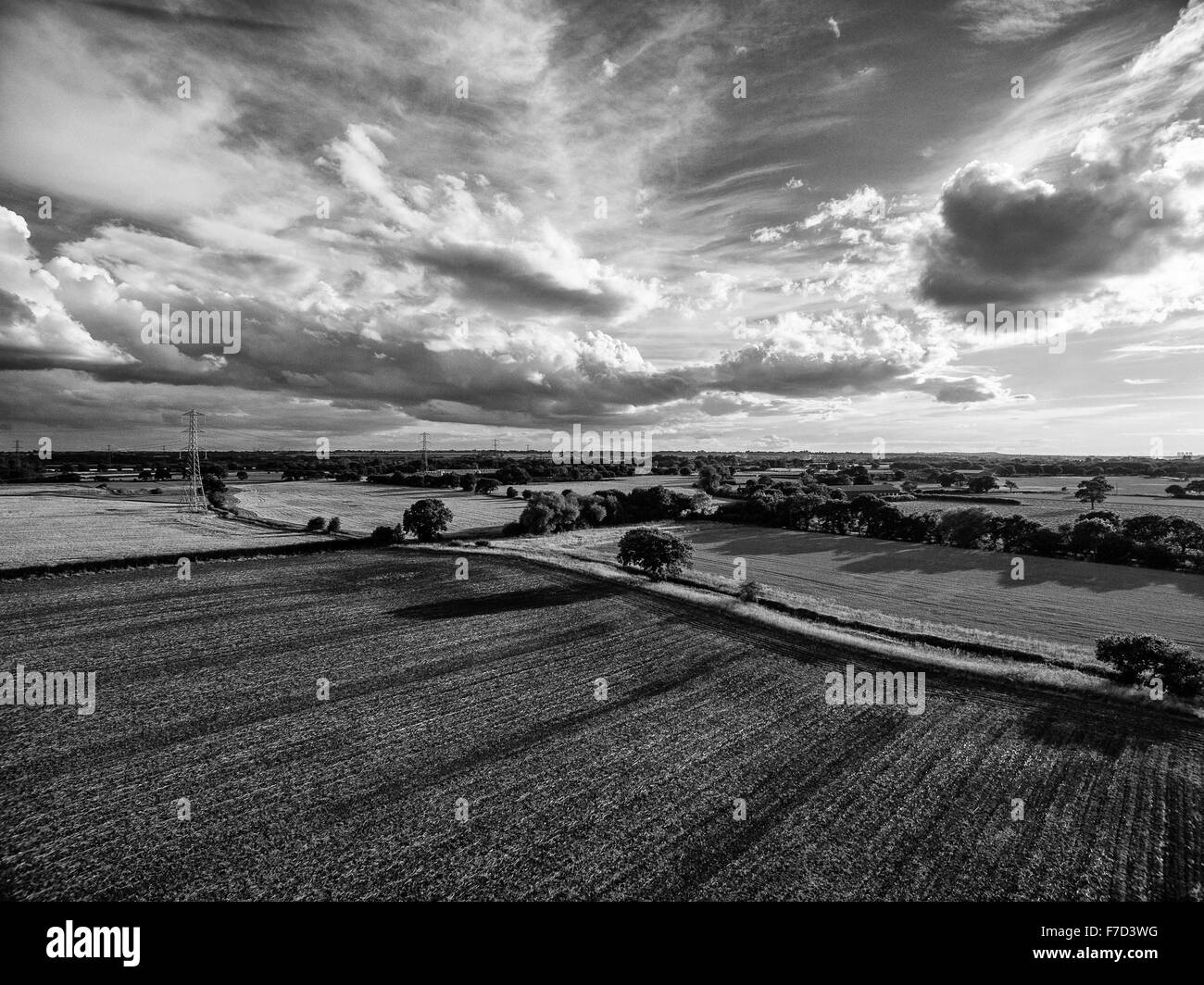 Aerial view of landscape and clouds above Stock Photo