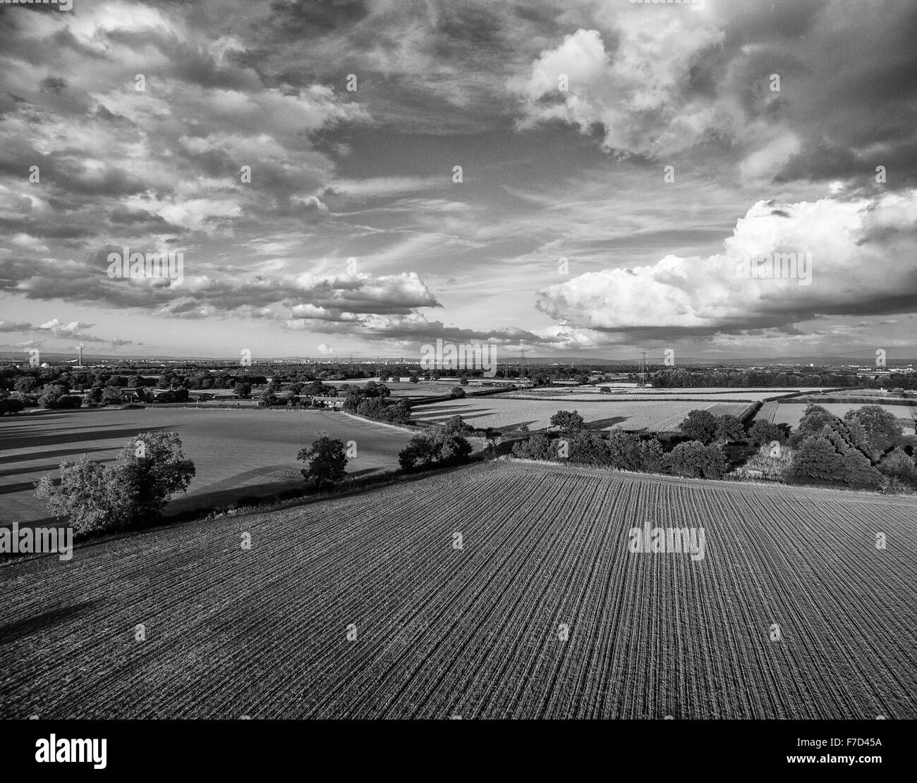 Aerial view of landscape and clouds above Stock Photo