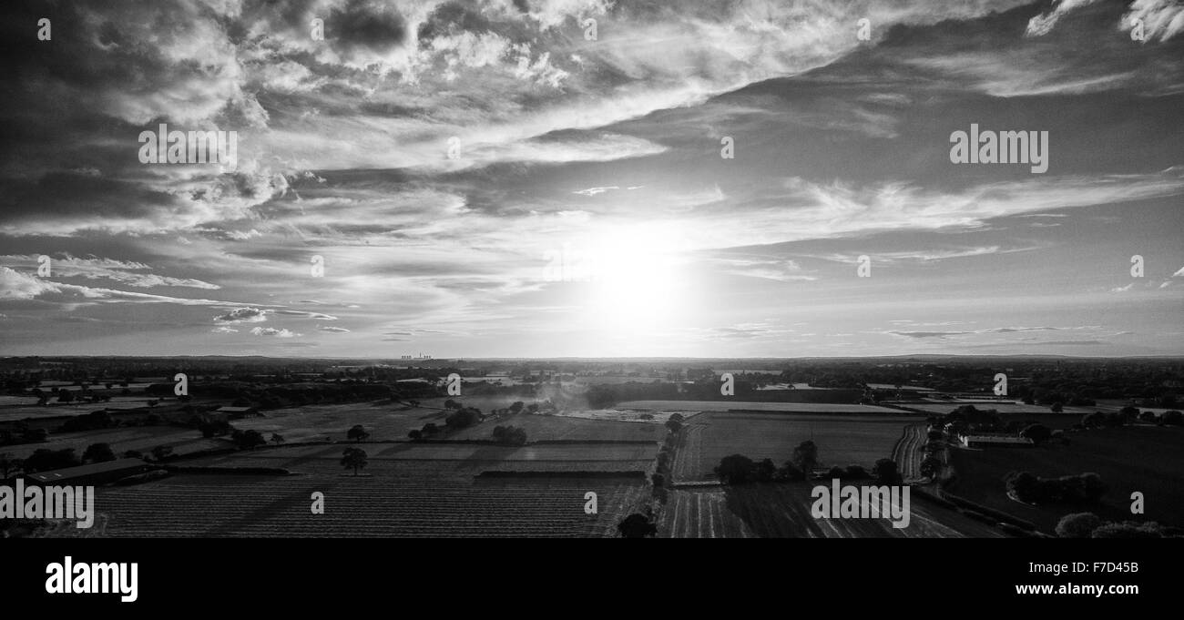 Aerial view of landscape and clouds above Stock Photo