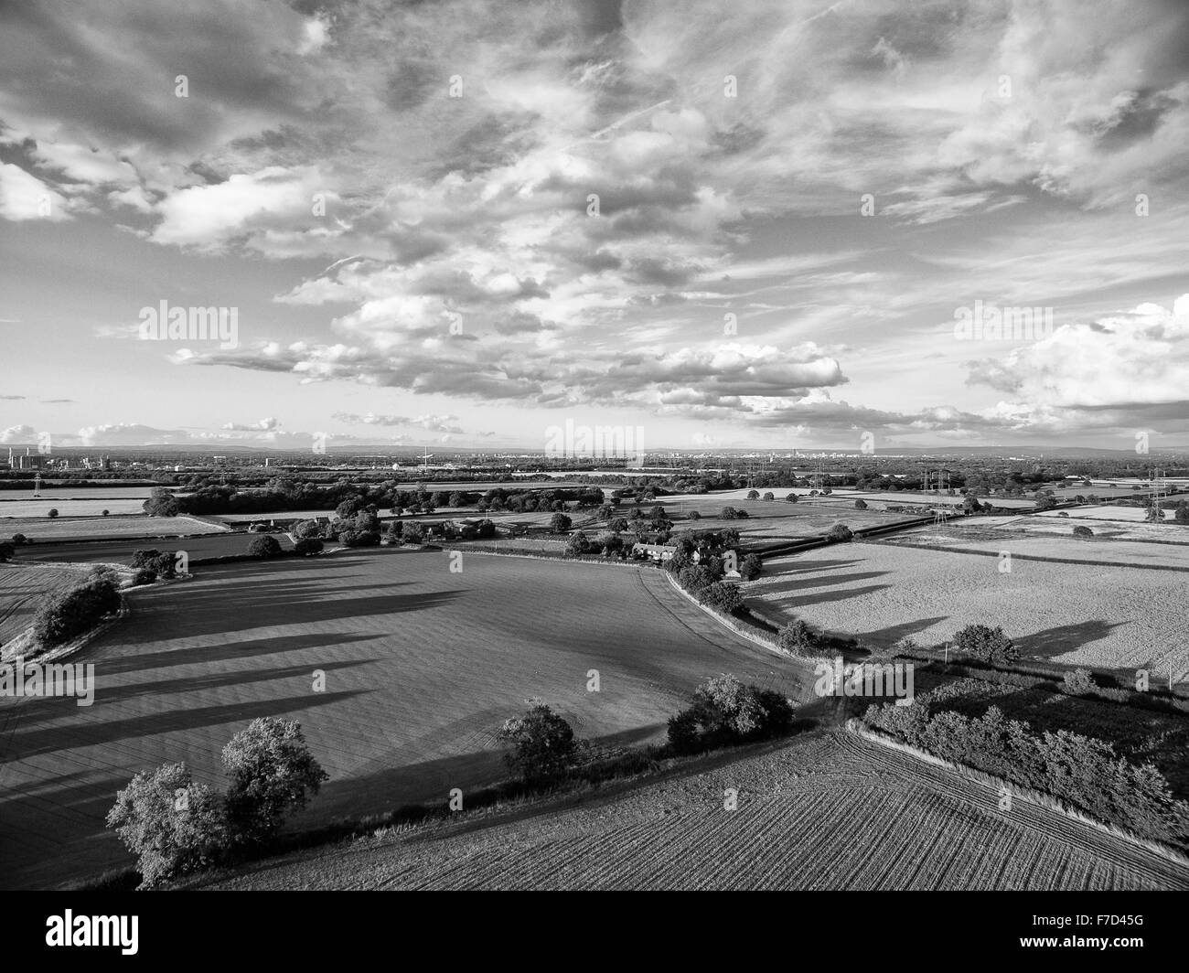 Aerial view of landscape and clouds above Stock Photo