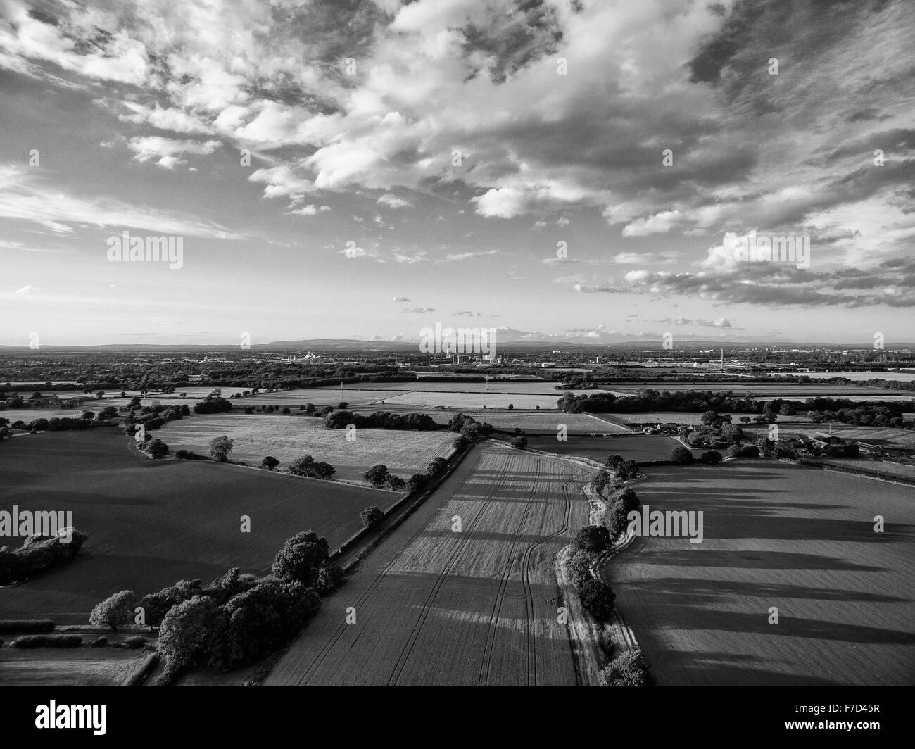 Aerial view of landscape and clouds above Stock Photo