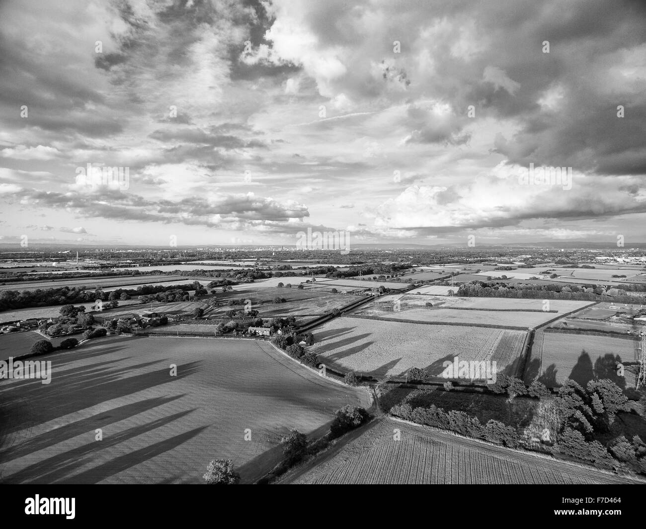 Aerial view of landscape and clouds above Stock Photo