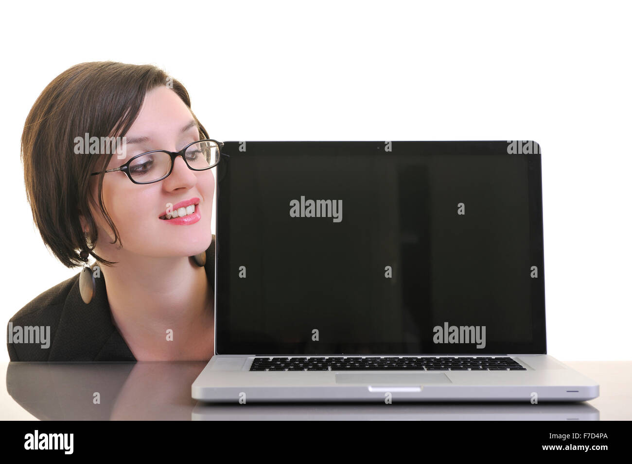 one young business woman isolated on white working on laptop computer ...