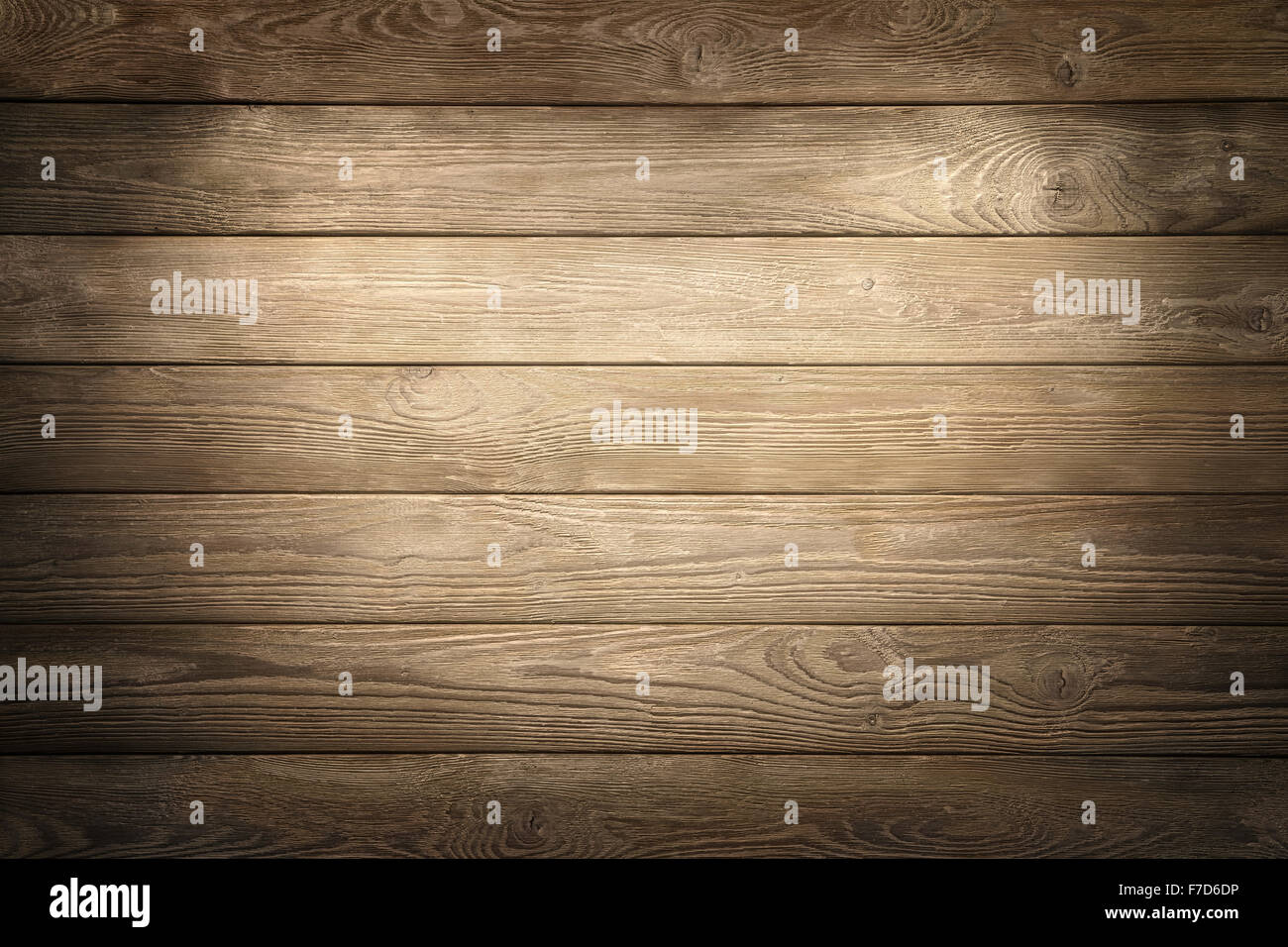 Elegant wood planks background nicely illuminated with spotlights to draw the attention Stock Photo