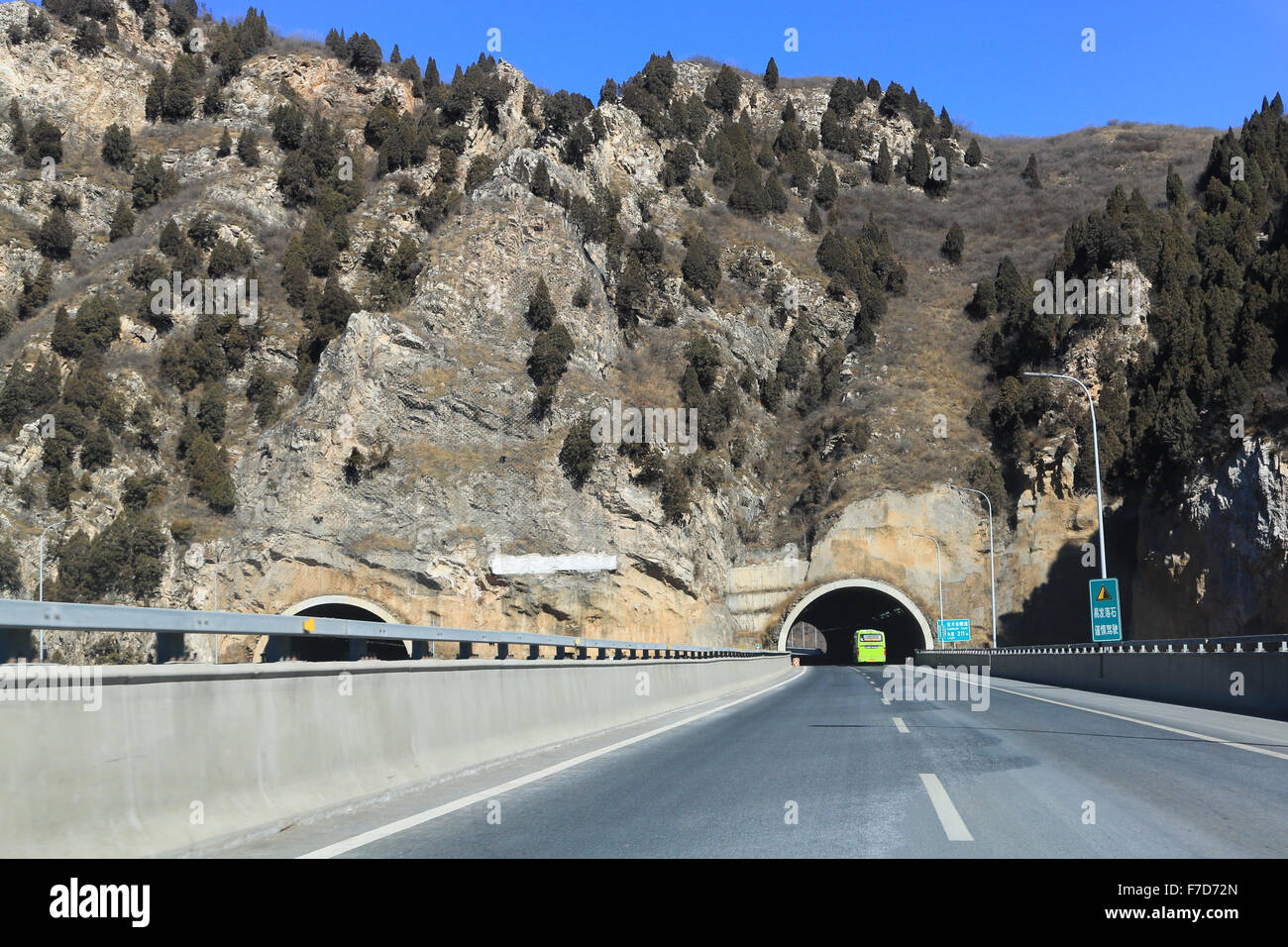 Approaching twin tunnel (211 m long) on Highway G45 Daguang Expressway headed north toward Great Wall. Stock Photo