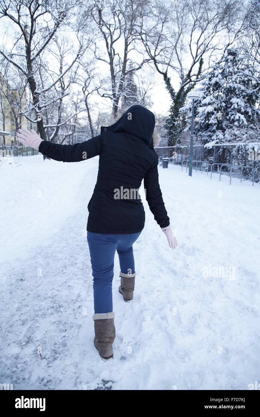 woman slipping on snow Stock Photo - Alamy