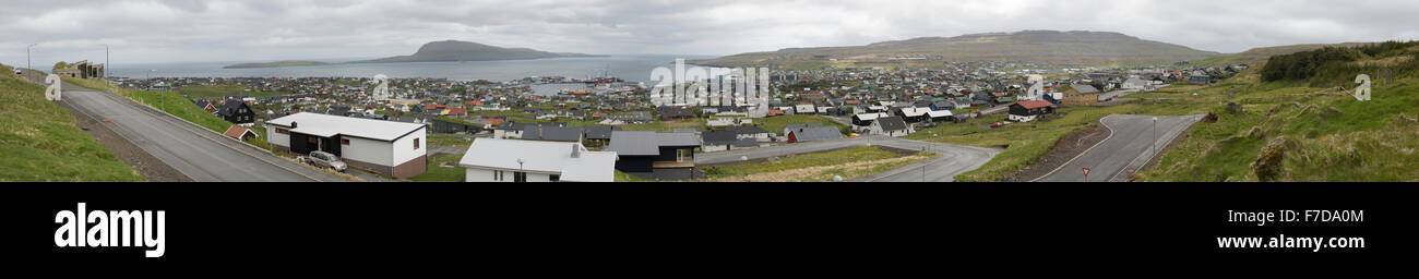 Cityscape of Torshavn on the Faroe Islands as seen from the surrounding mountains with harbor and houses Stock Photo
