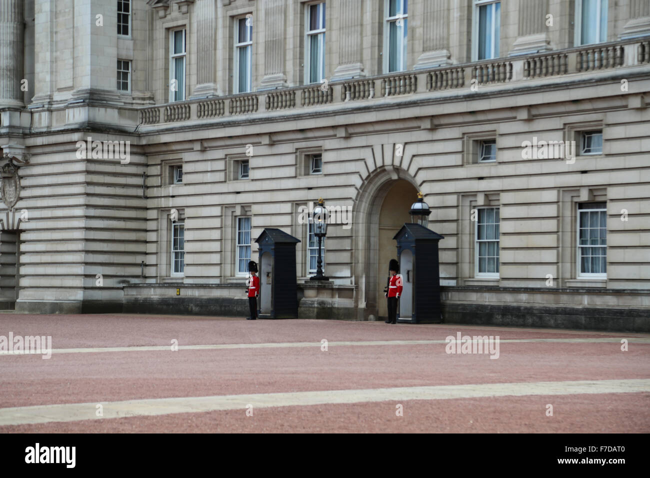 The Royal Guards standing in front of Buckingham Palace right before the Changing of the Guards. Stock Photo