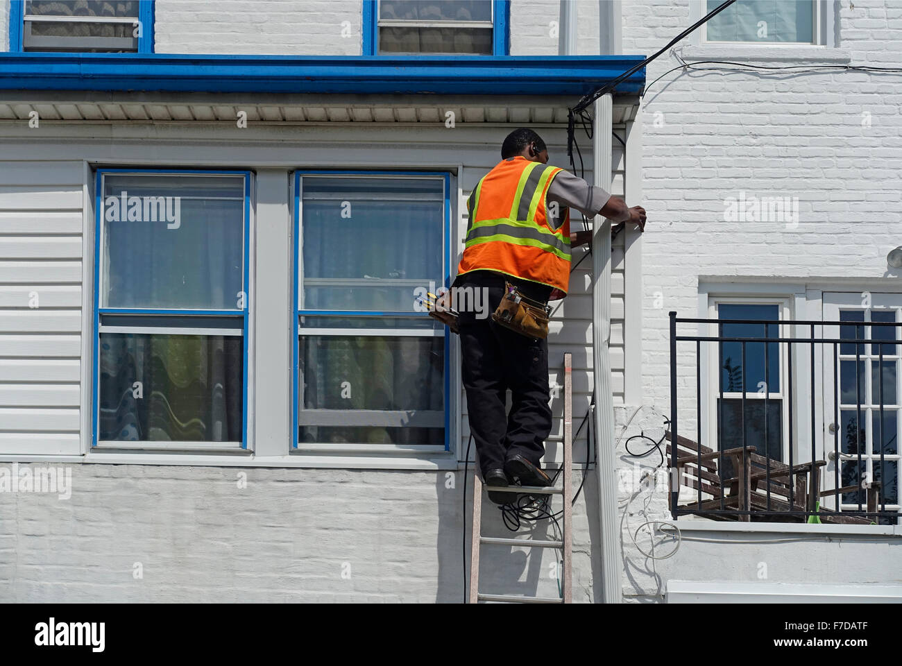 cable repair man in Brooklyn NYC Stock Photo Alamy