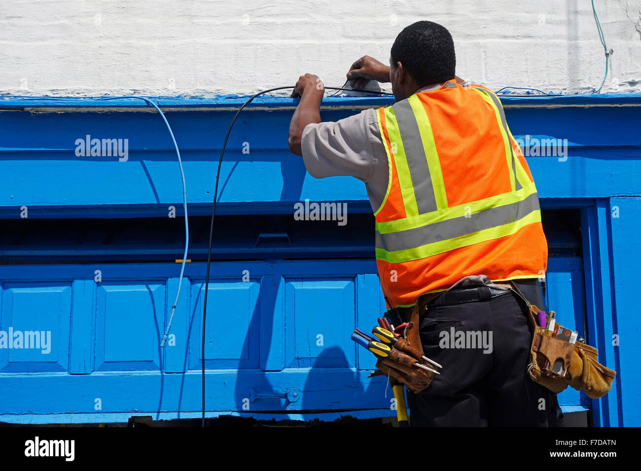 cable repair man in Brooklyn NYC Stock Photo Alamy