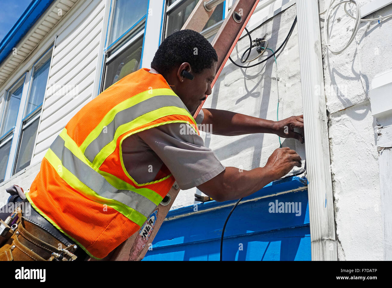 cable repair man in Brooklyn NYC Stock Photo Alamy