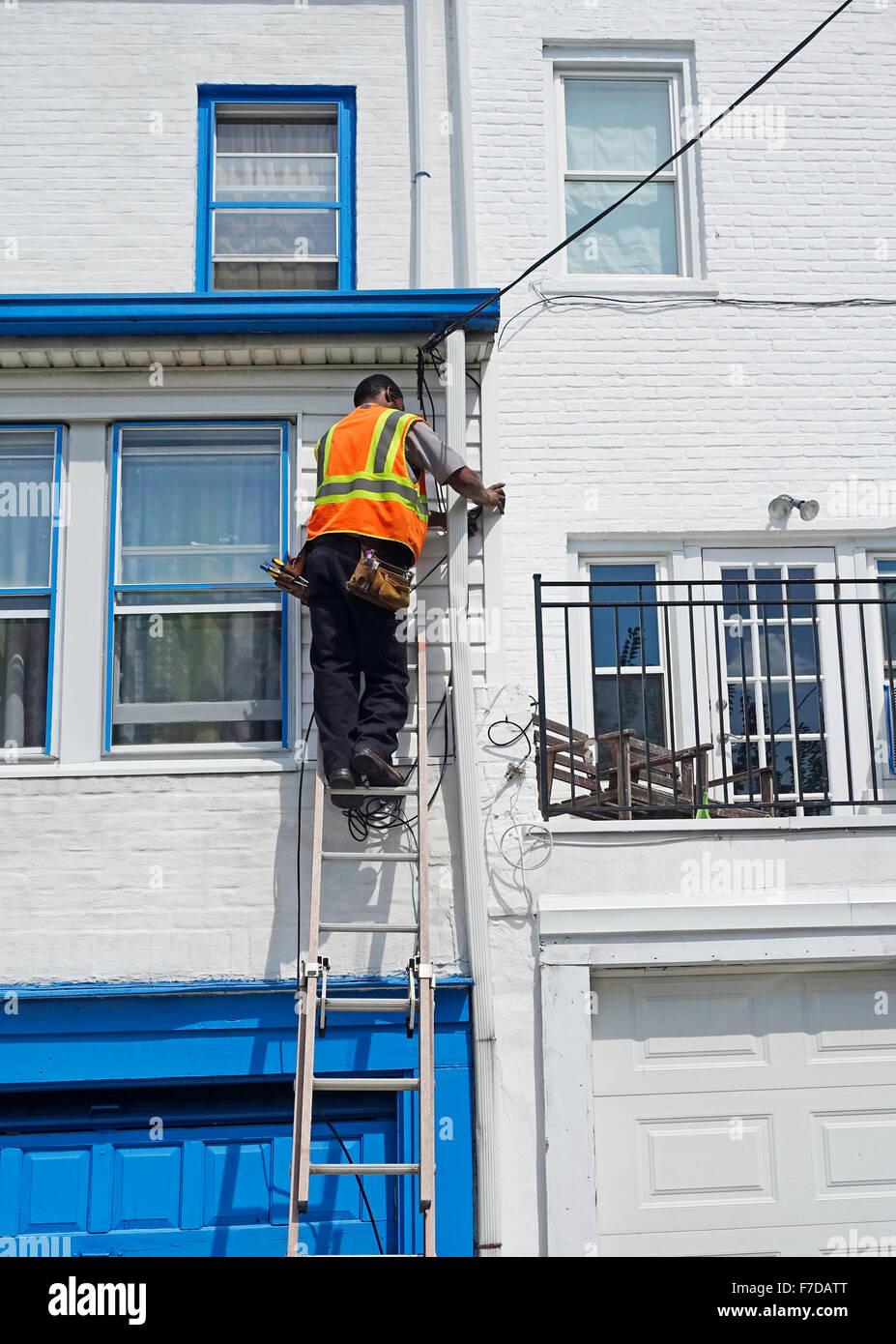 cable repair man in Brooklyn NYC Stock Photo Alamy