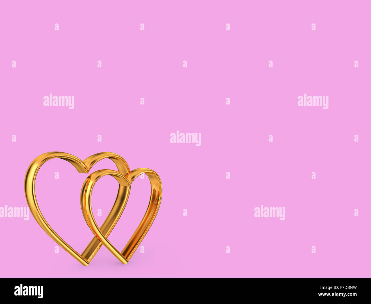 a hearts of gold on a pink background Stock Photo - Alamy