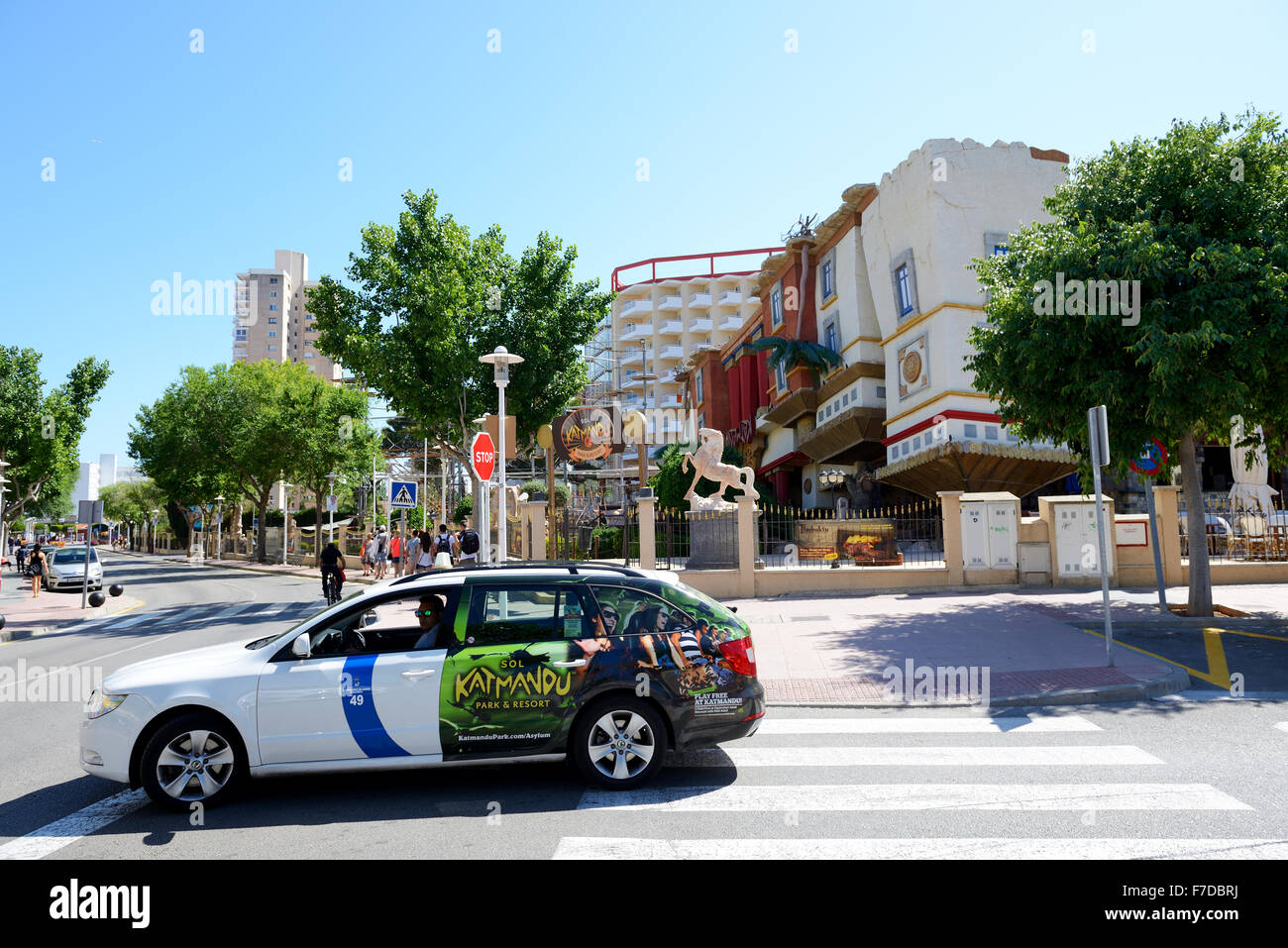 The taxi car and tourists enjoiying their vacation near Katmandu Park, Mallorca, Spain Stock Photo