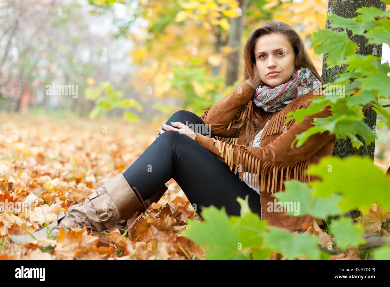 Portrait of beauty girl in autumn park Stock Photo - Alamy
