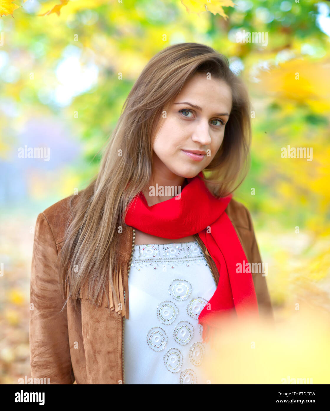 Portrait of beauty girl in autumn park Stock Photo - Alamy