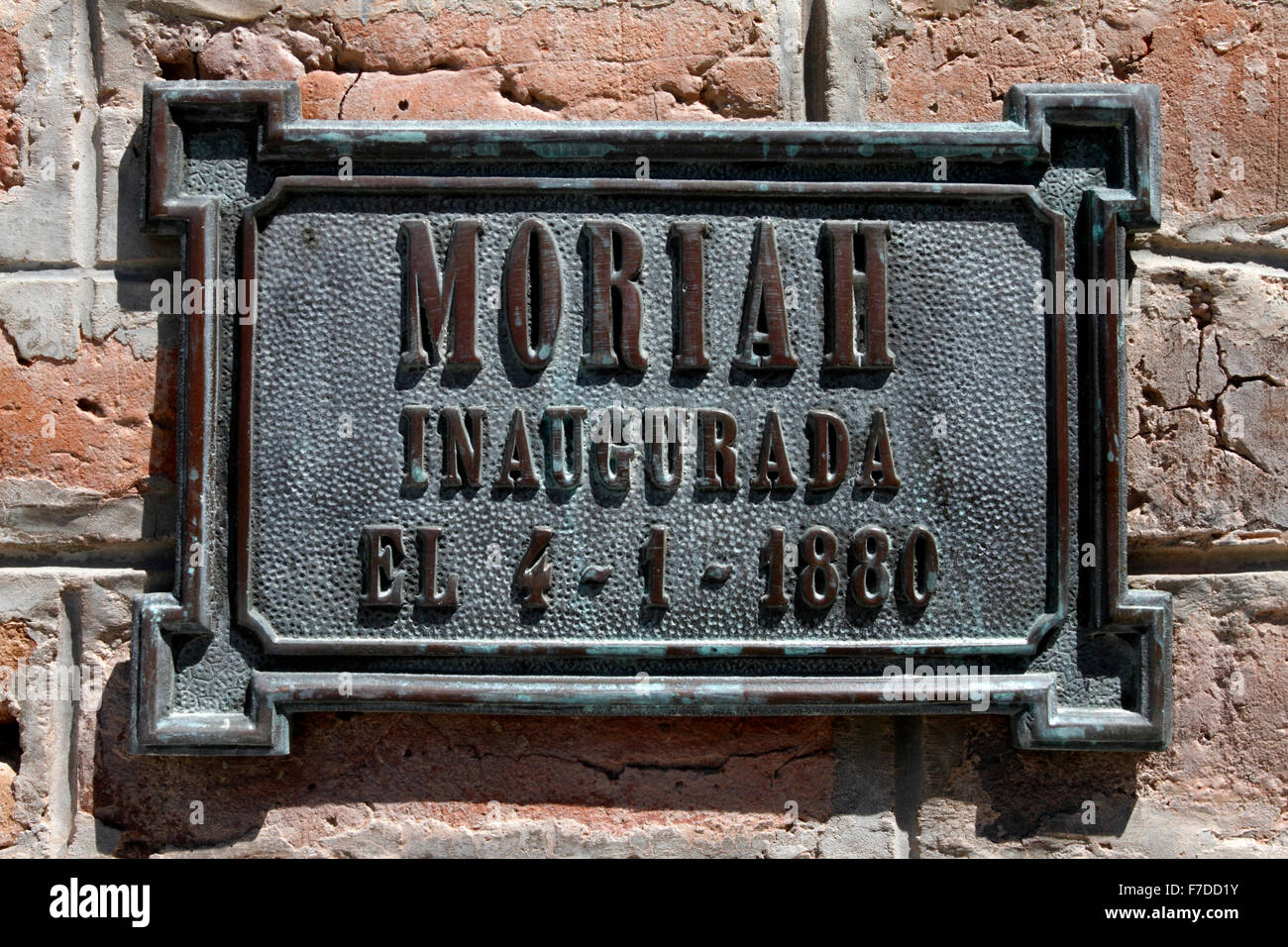 Plaque on the wall of Moriah Chapel with a visitor entering the chapel, Trelew, Chubut, Patagonia Argentina Stock Photo