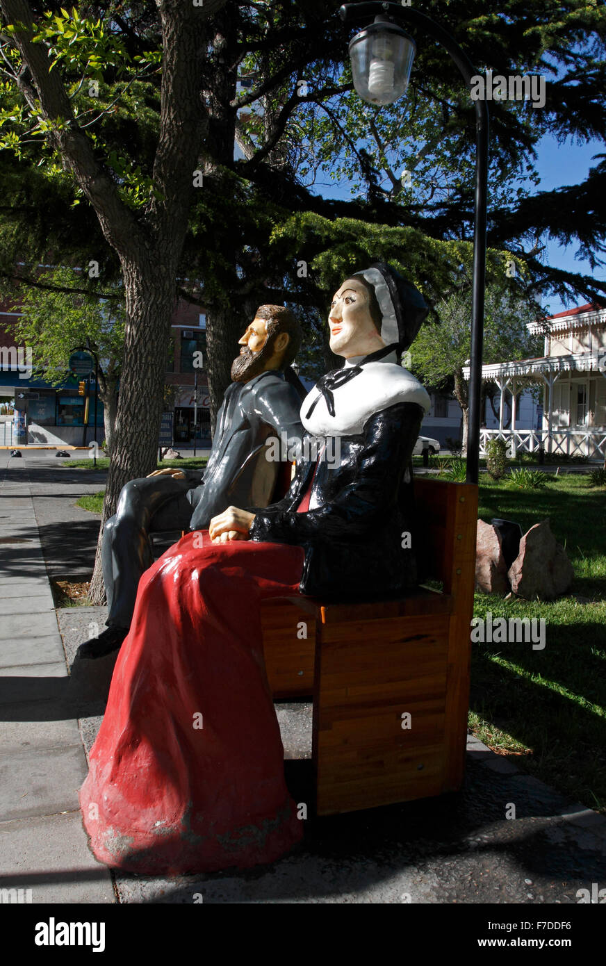 outdoor exhibit of art showing two of the original settlers who came