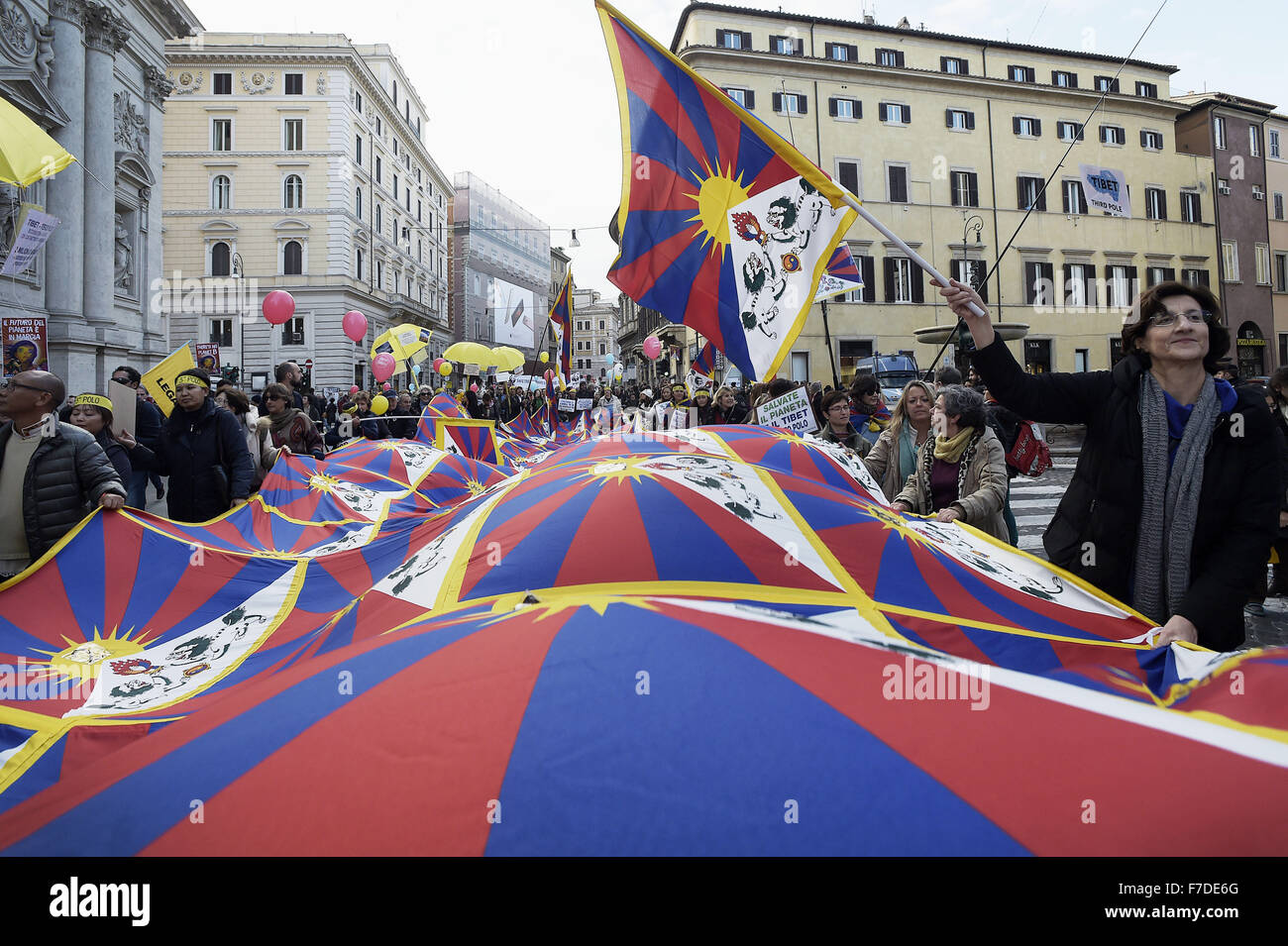 Nov. 29, 2015 - Europe, Italy, Rome, november 29, 2015 :Demonstrators march during a rally calling for action on climate change on November 29, 2015 in Rome a day before the launch of the COP21 conference in Paris. Some 150 leaders including US President Barack Obama, China's Xi Jinping, India's Narendra Modi and Russia's Vladimir Putin will attend the start of the UN conference Monday, tasked with reaching the first truly universal climate pact. The goal is to limit average global warming to two degrees Celsius (3.6 degrees Fahrenheit), perhaps less, over pre-Industrial Revolution levels by c Stock Photo