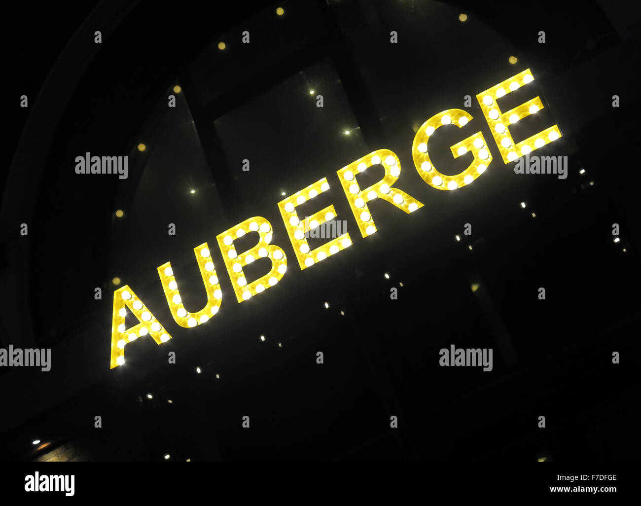 Illuminated Auberge restaurant sign at the French brasserie near Waterloo station and London’s South Bank, England, UK. Stock Photo