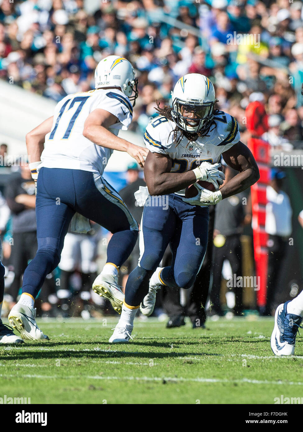 Jacksonville, FL, USA. 29th Nov, 2015.  d17 hands the ball off to San Diego Chargers running back Melvin Gordon (28) during 1st half NFL game action between the San Diego Chargers and the Jacksonville Jaguars at EverBank Field in Jacksonville, Fl. Romeo T Guzman/CSM/Alamy Live News Stock Photo