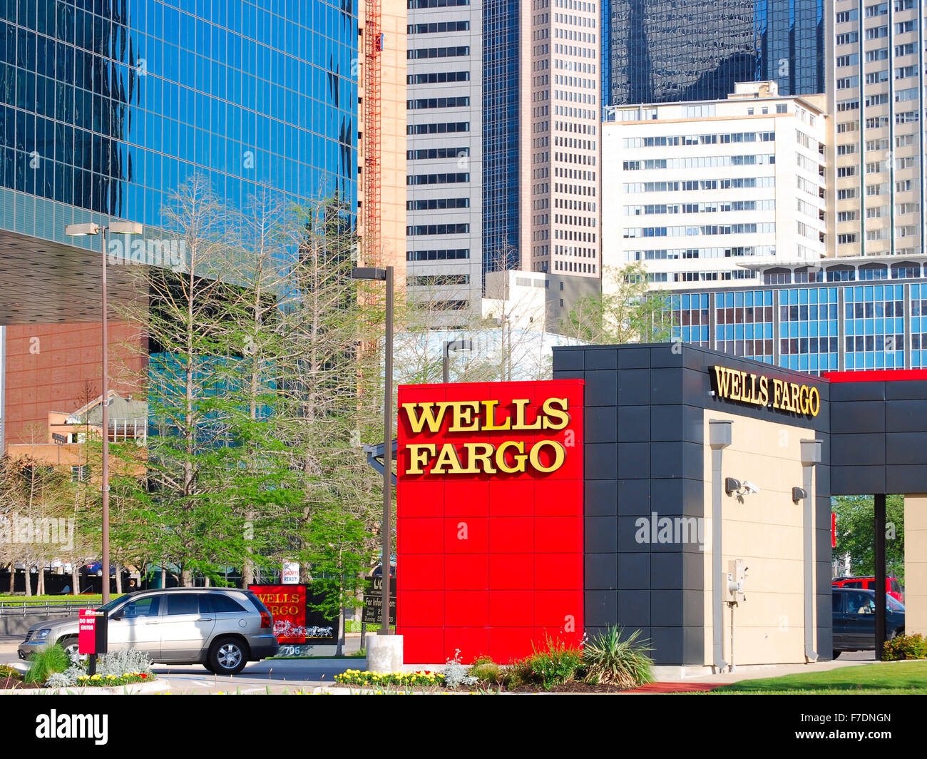 Wells Fargo branch in downtown Dallas, Texas with skyscrapers and office buildings in the background. Stock Photo
