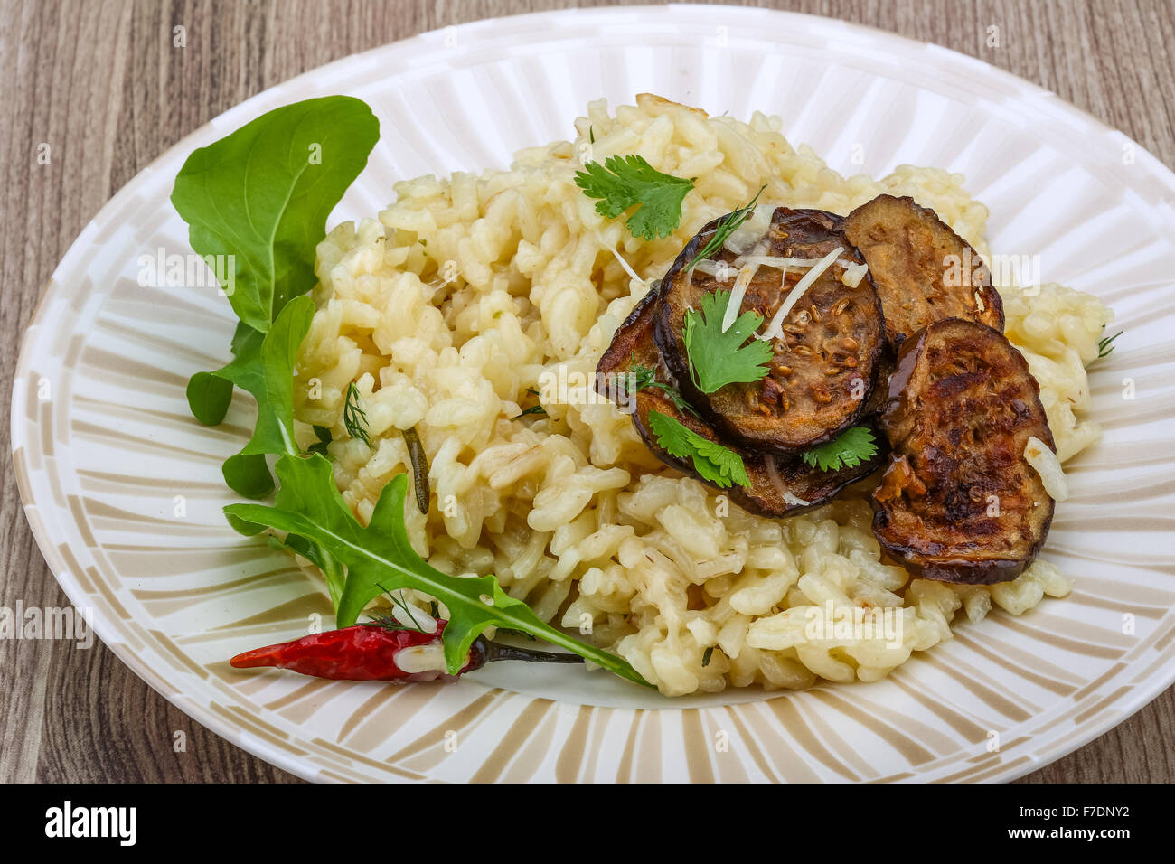 Italian trditional Risotto with eggplant and coriander Stock Photo Alamy