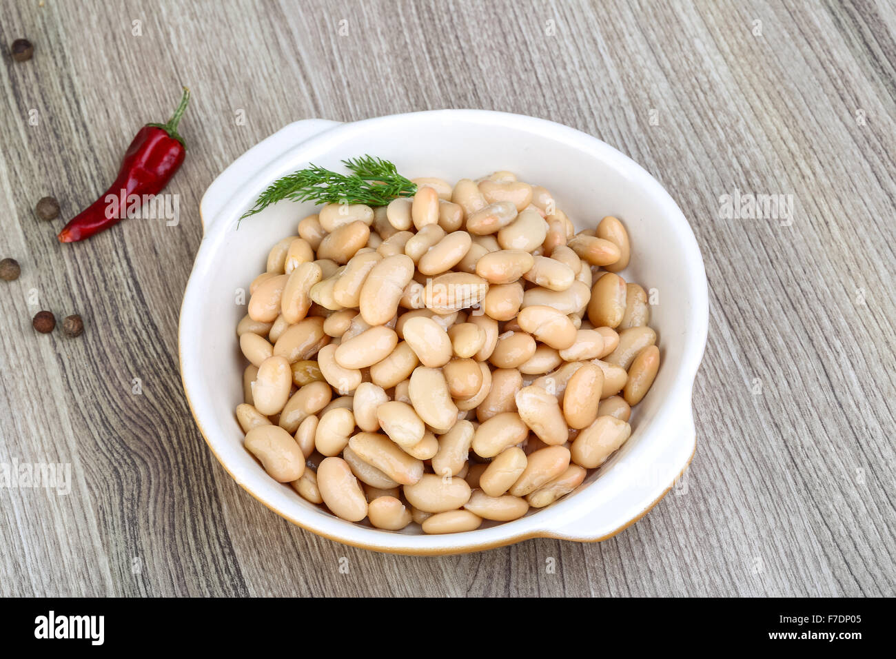 Canned white beans with green fresh dill leaf Stock Photo Alamy