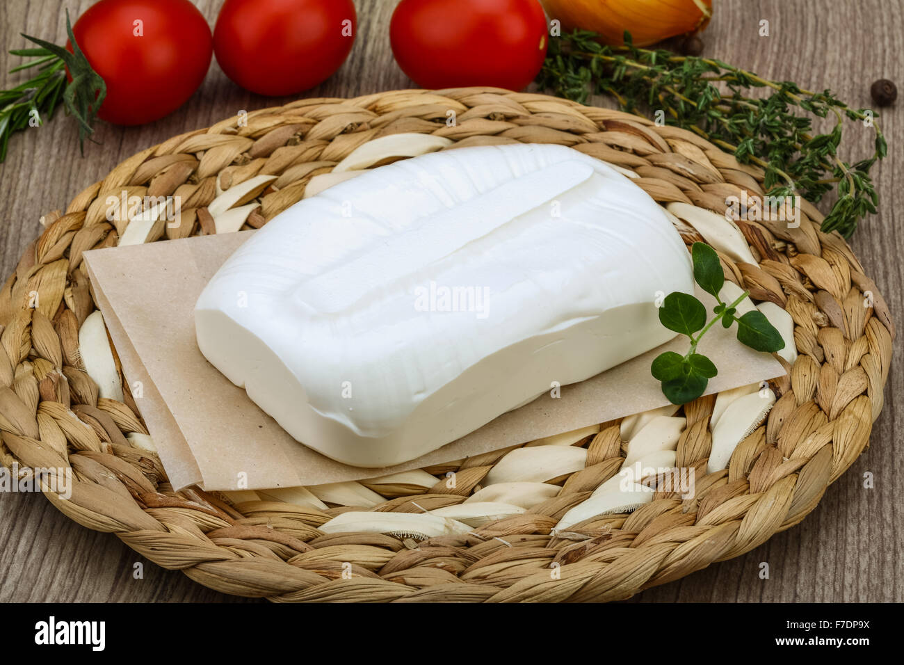 Traditional Greek cheese - Feta with herbs on the wood background Stock ...