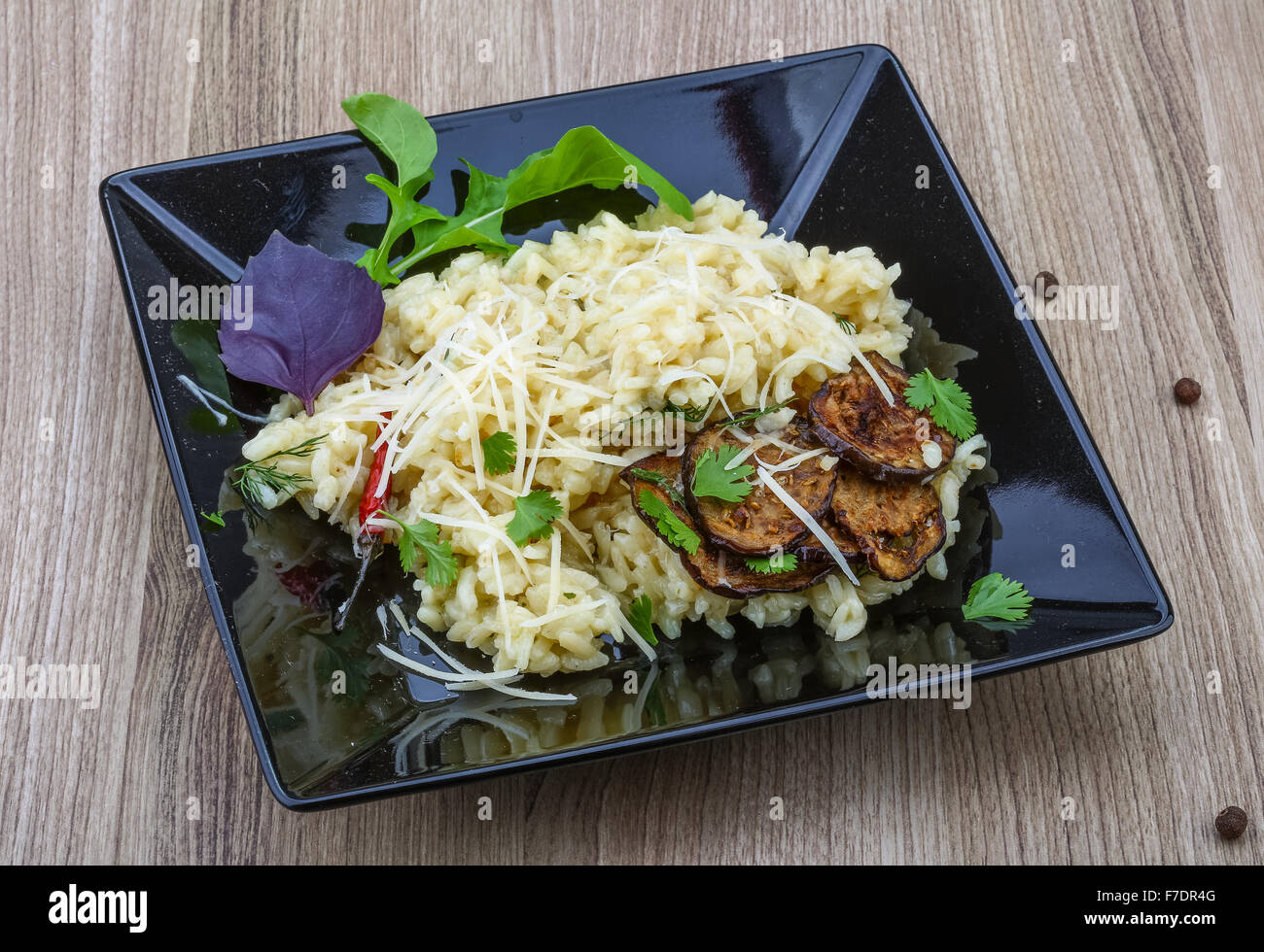 Italian trditional Risotto with eggplant and coriander Stock Photo Alamy