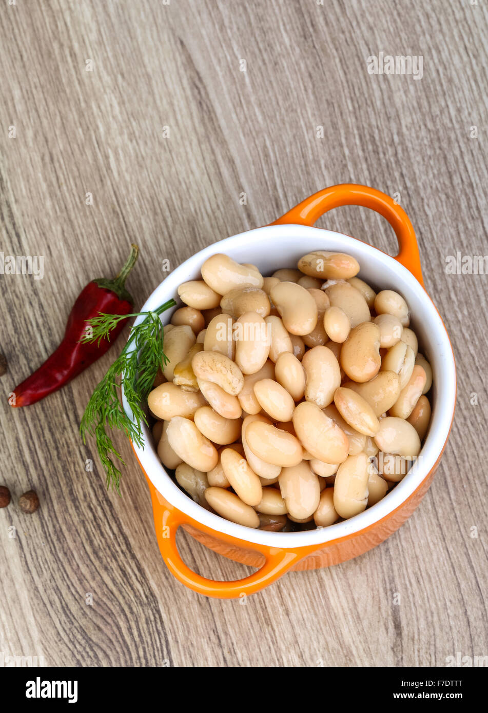 Canned white beans with green fresh dill leaf Stock Photo Alamy