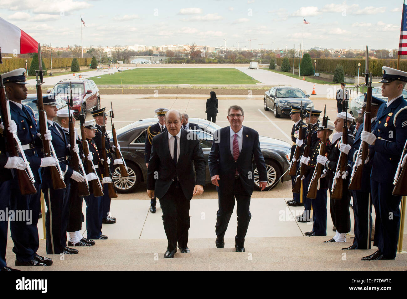 US Secretary of Defense Ash Carter welcomes French Minister of Defence Jean-Yves le Drian to the Pentagon November 24, 2015 in Arlington, Virginia. The visit comes after the terrorist attacks on Paris. Stock Photo