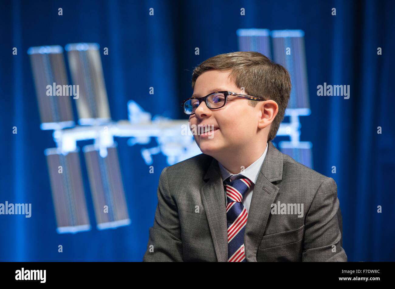 NASA Administrator Charles Bolden is interviewed by nine-year old Max from Humans of New York at NASA Headquarters November 23, 2015 in Washington, DC. Max was featured on the HONY Facebook page on Nov. 14 stating he'd like to be a reporter like his dad, 'I'd start by going to the Director of NASA. Then I'd ask him about his rockets. And if any of them were going to space. Stock Photo