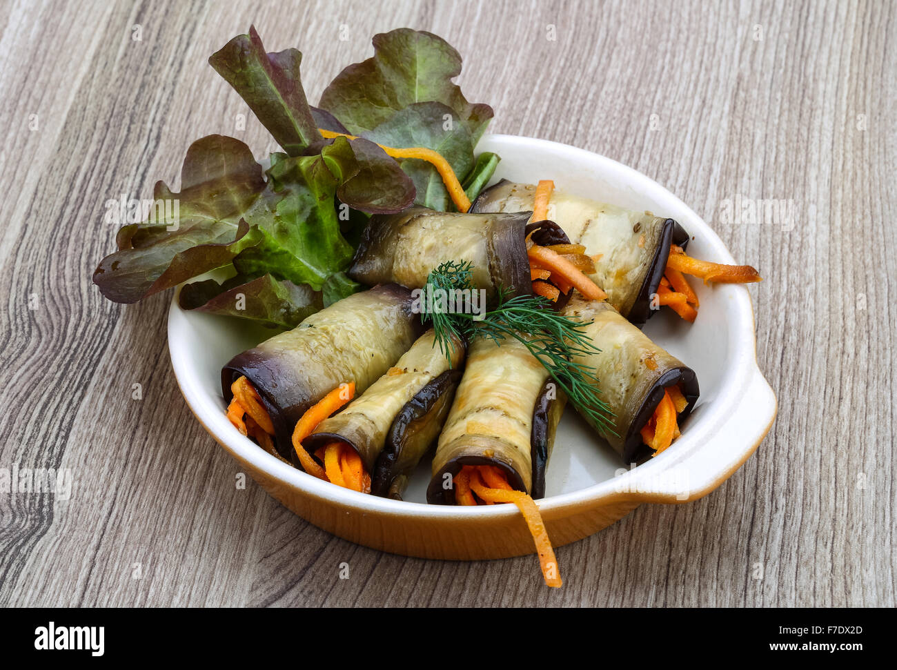 Eggplant rolls with carrot served spices and coriander Stock Photo Alamy