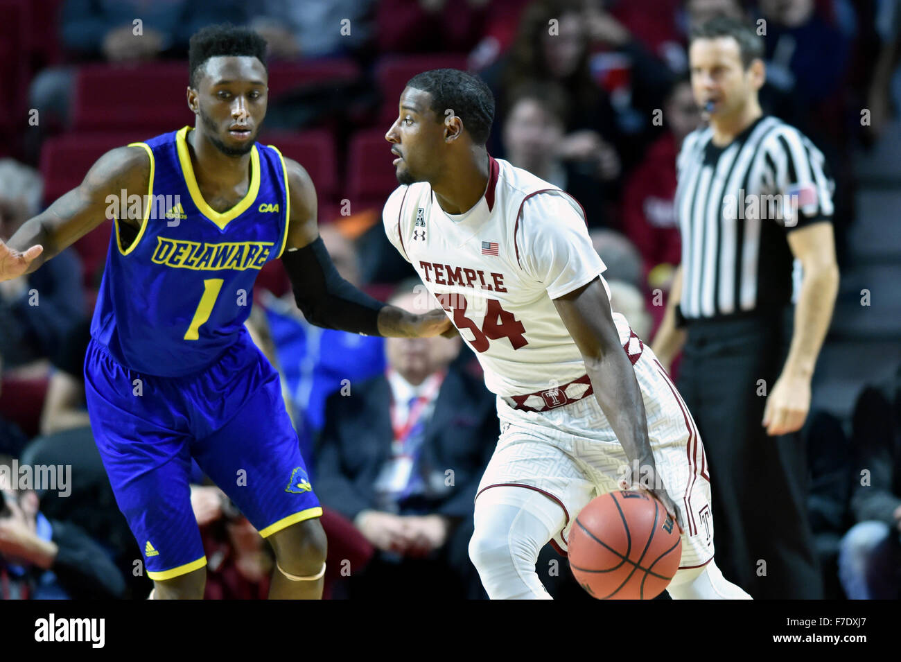 Philadelphia, Pennsylvania, USA. 29th Nov, 2015. Temple Owls guard DEVIN COLEMAN (34) dribbles the ball as Delaware Fightin Blue Hens guard KORY HOLDEN (1) defends during the NCAA basketball game played at the Liacouras Center in Philadelphia. Temple beat Delaware 69-50. © Ken Inness/ZUMA Wire/Alamy Live News Stock Photo