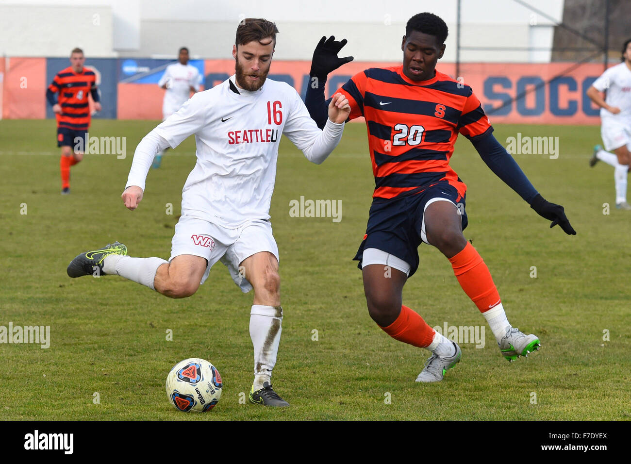 Syracuse, New York, USA. 29th Nov, 2015. Seattle Redhawks defender Josh  Greene (16) shoots the ball as Syracuse Orange defender Kamal Miller (20)  defends during the first half of a NCAA Division, image size:1300x956