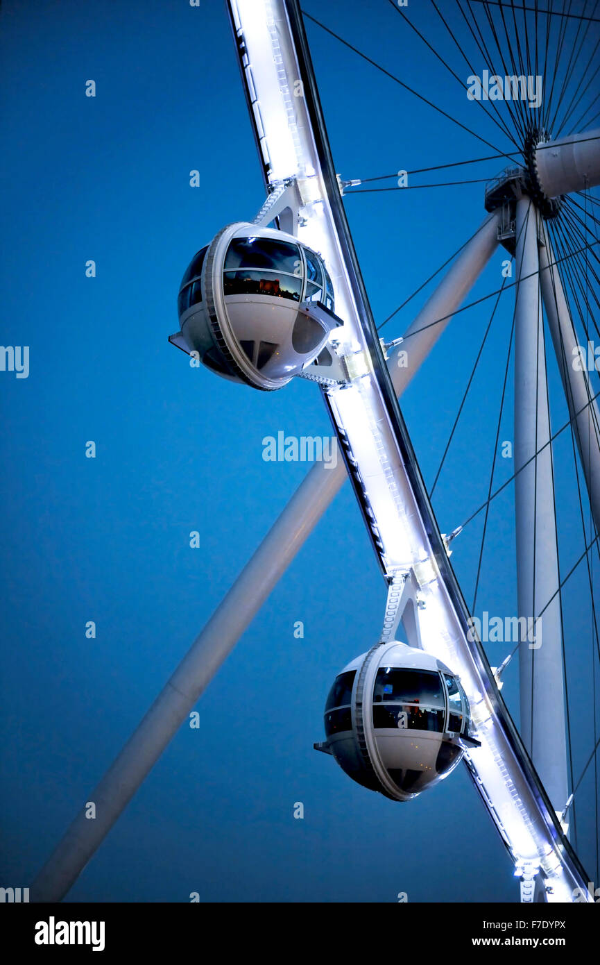 Observation cabins of the High Roller a 550-foot-tall Ferris wheel at twilight, Stock Photo