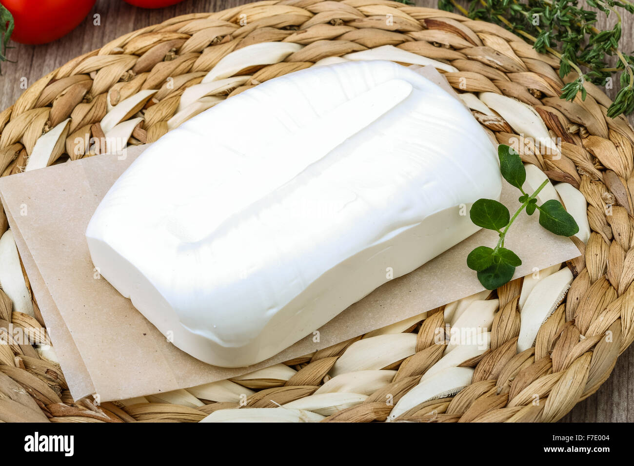 Traditional Greek cheese - Feta with herbs on the wood background Stock ...