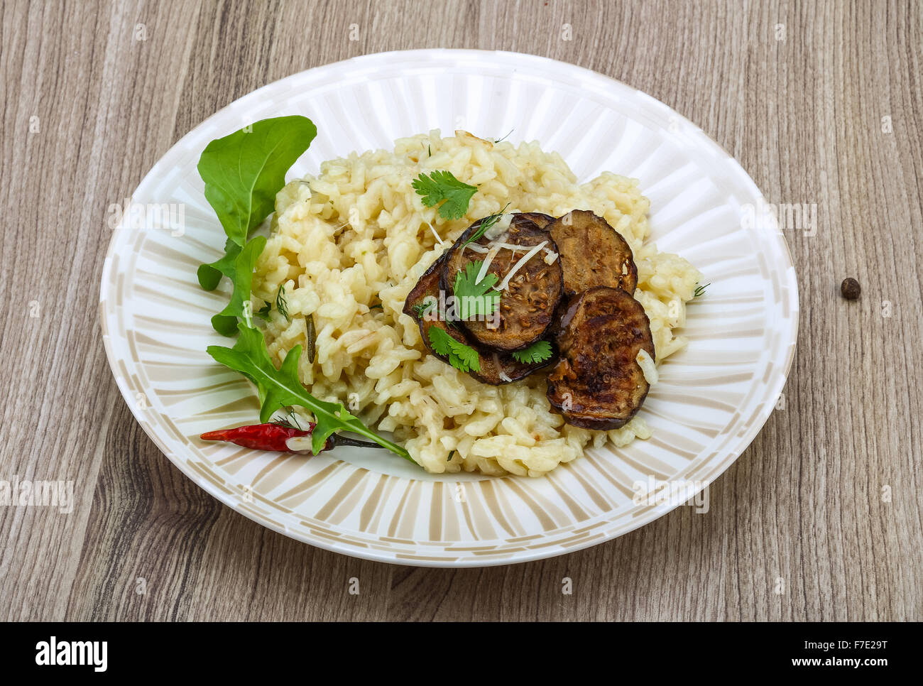 Italian trditional Risotto with eggplant and coriander Stock Photo Alamy