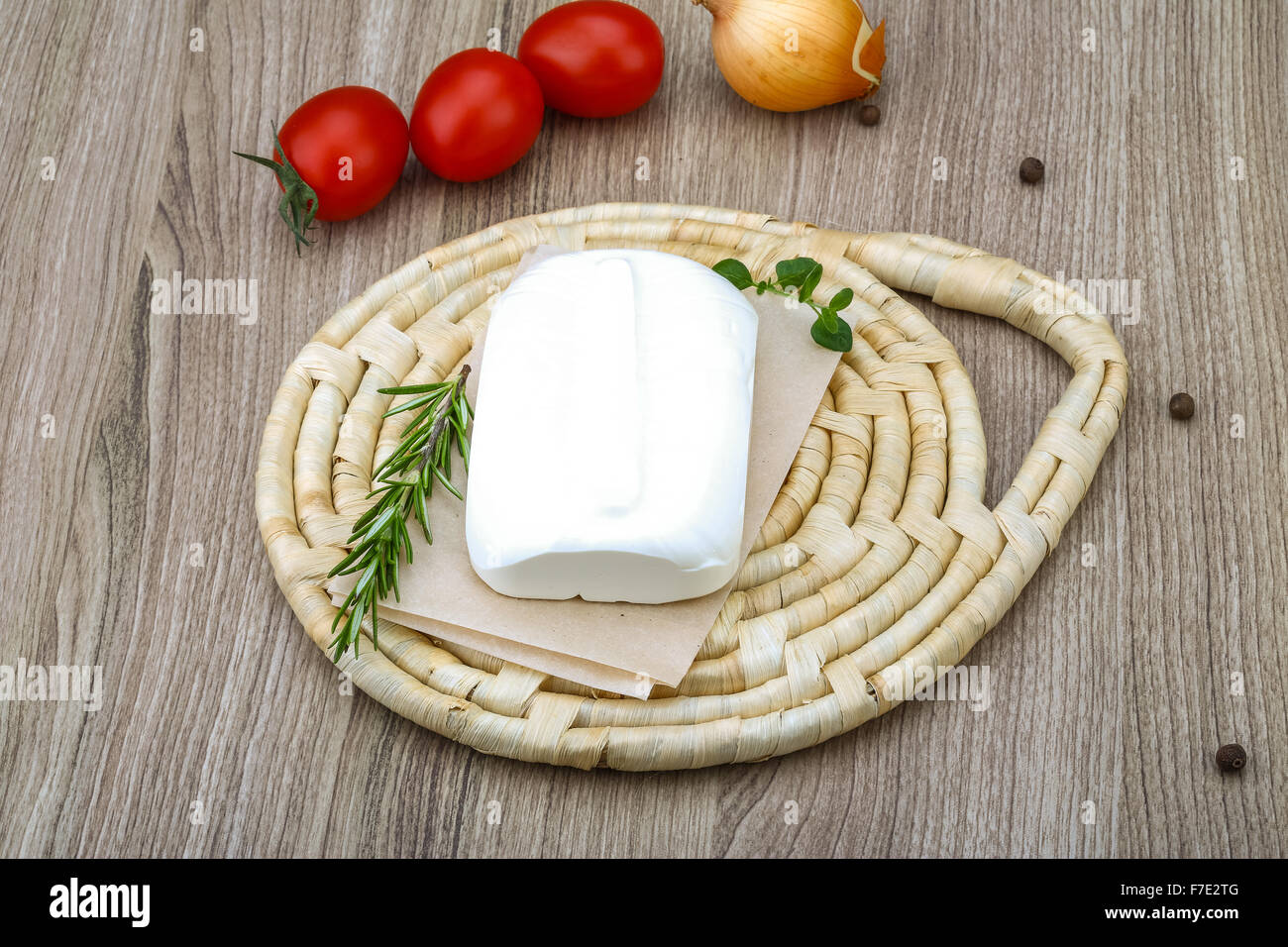 Traditional Greek cheese - Feta with herbs on the wood background Stock ...