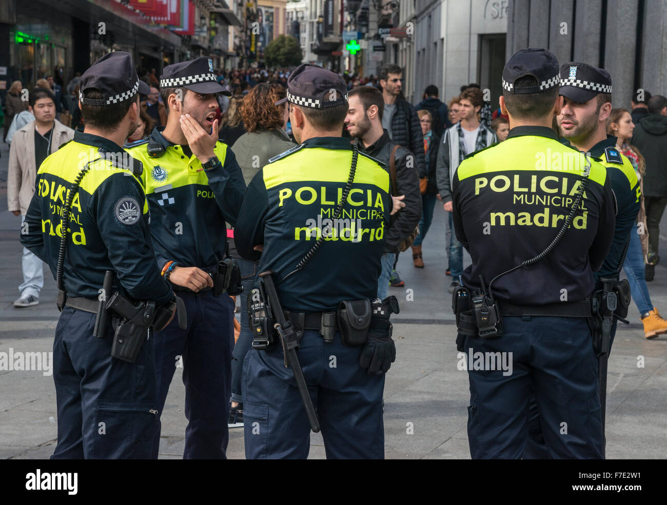 Municipal Police on duty in the Puerta del Sol, Madrid, Spain Stock Photo