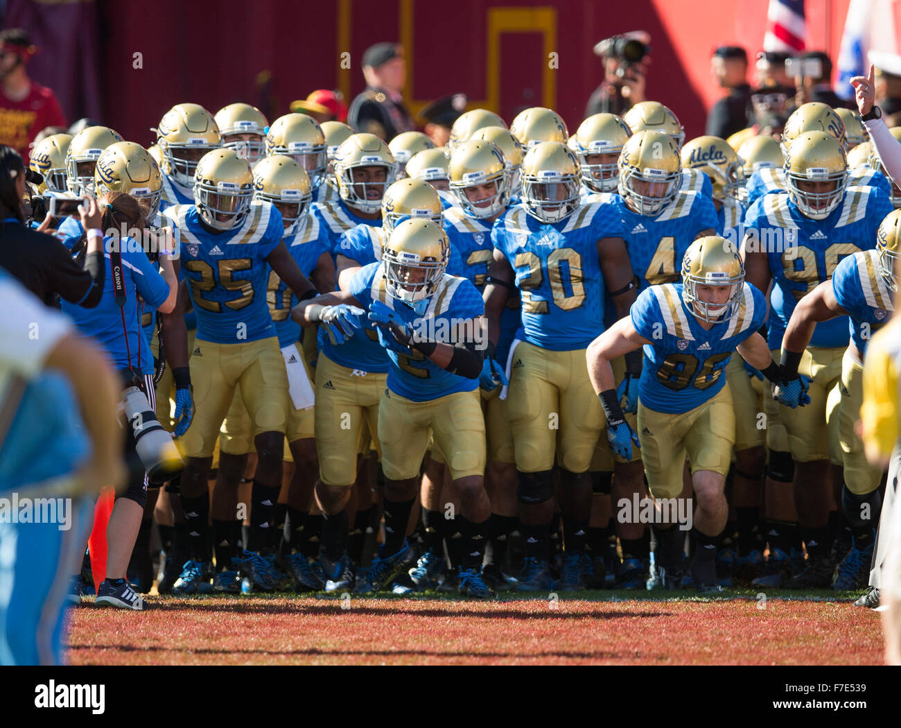 Los Angeles, CA, USA. 28th Nov, 2015. The UCLA Bruins run out onto the field before a game between the UCLA Bruins and the USC Trojans at the Los Angeles Memorial Coliseum in Los Angeles, California. USC defeated the UCLA Bruins 40-21.(Mandatory Credit: Juan Lainez/MarinMedia/Cal Sport Media) © csm/Alamy Live News Stock Photo