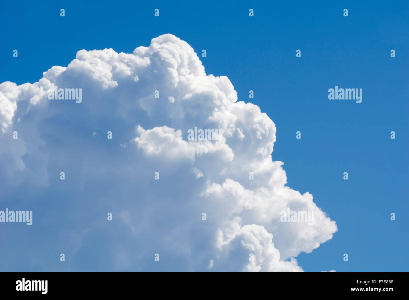 Big white cloud against blue sky Stock Photo - Alamy