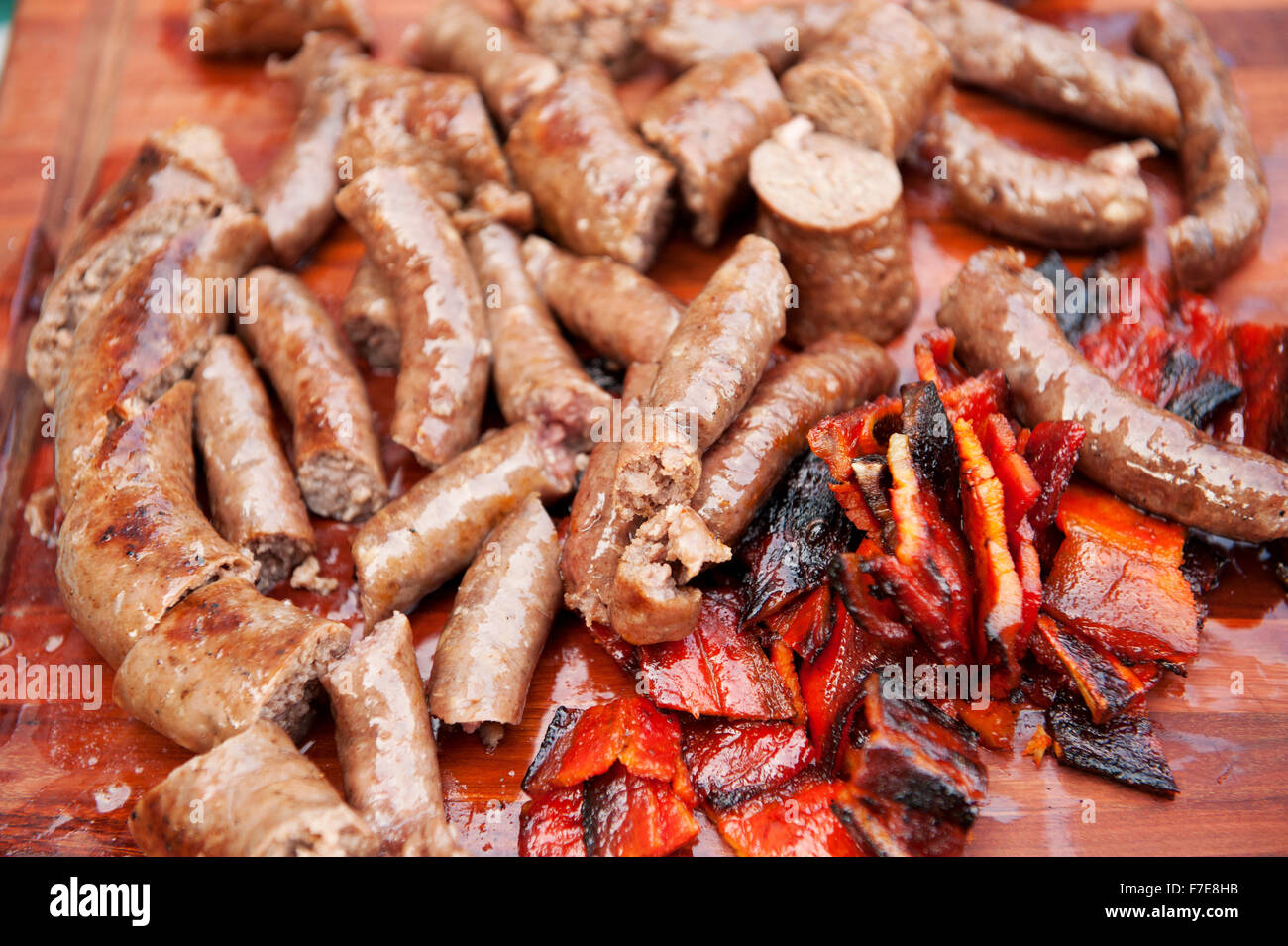 Traditional South African Boerwors sausage cooks on a Braai, or South