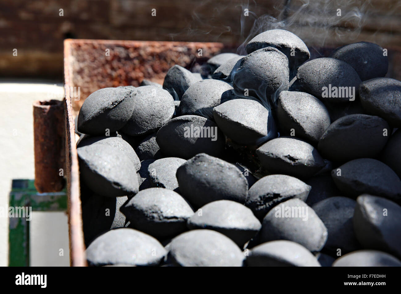 A barbecue with charcoal stones Stock Photo - Alamy