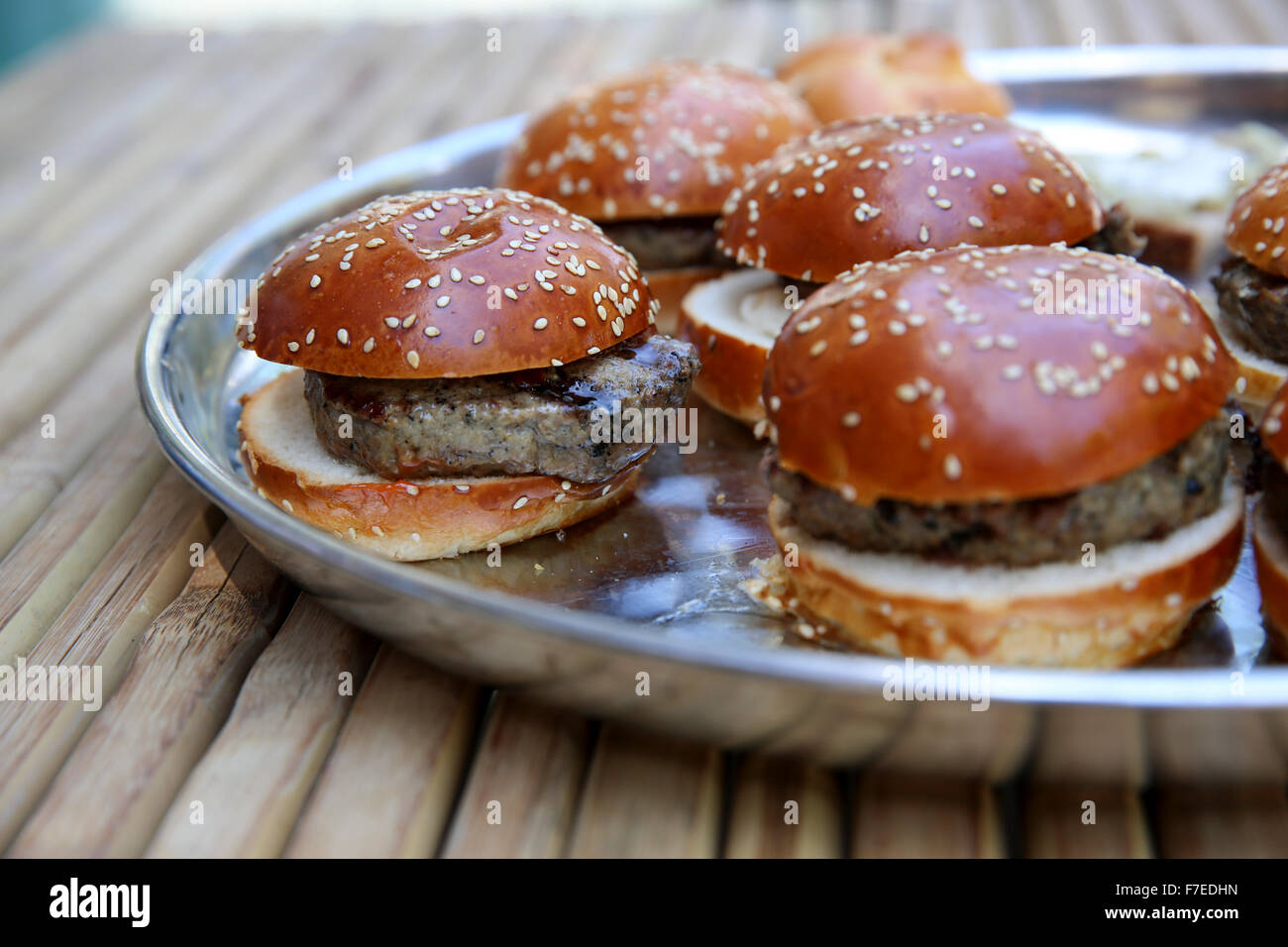 Hamburger on bun Stock Photo Alamy