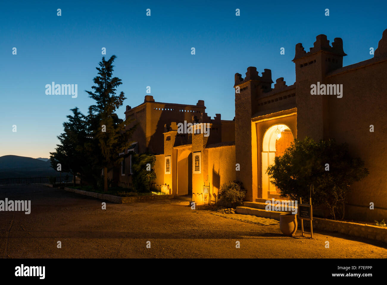 Kasbah style hotel at twilight, blue hour, Boumalne-du-Dades, Dades Valley, Morocco Stock Photo