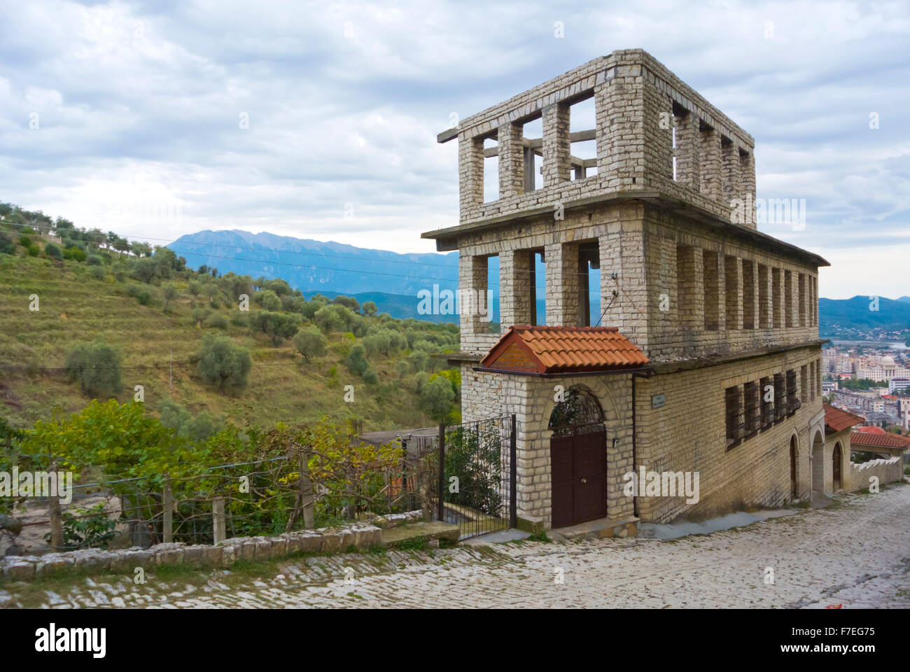 Unfinished residential building, Rruga Mihal Komnena, road to Kalaja, the castle, fortress hill, Berat, Albania Stock Photo