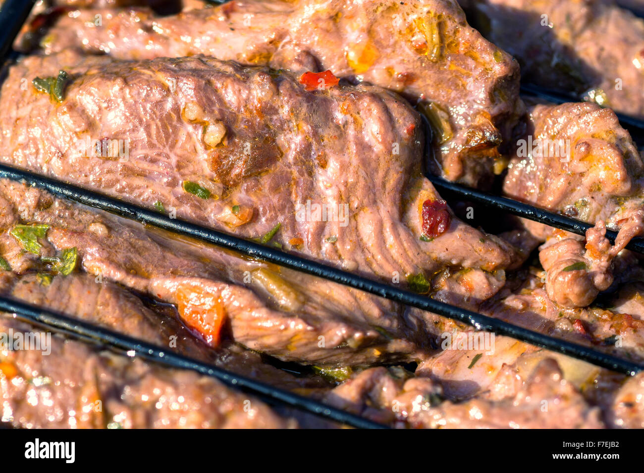 BBQ meat beef with spices cooking on a closed grill Stock Photo Alamy